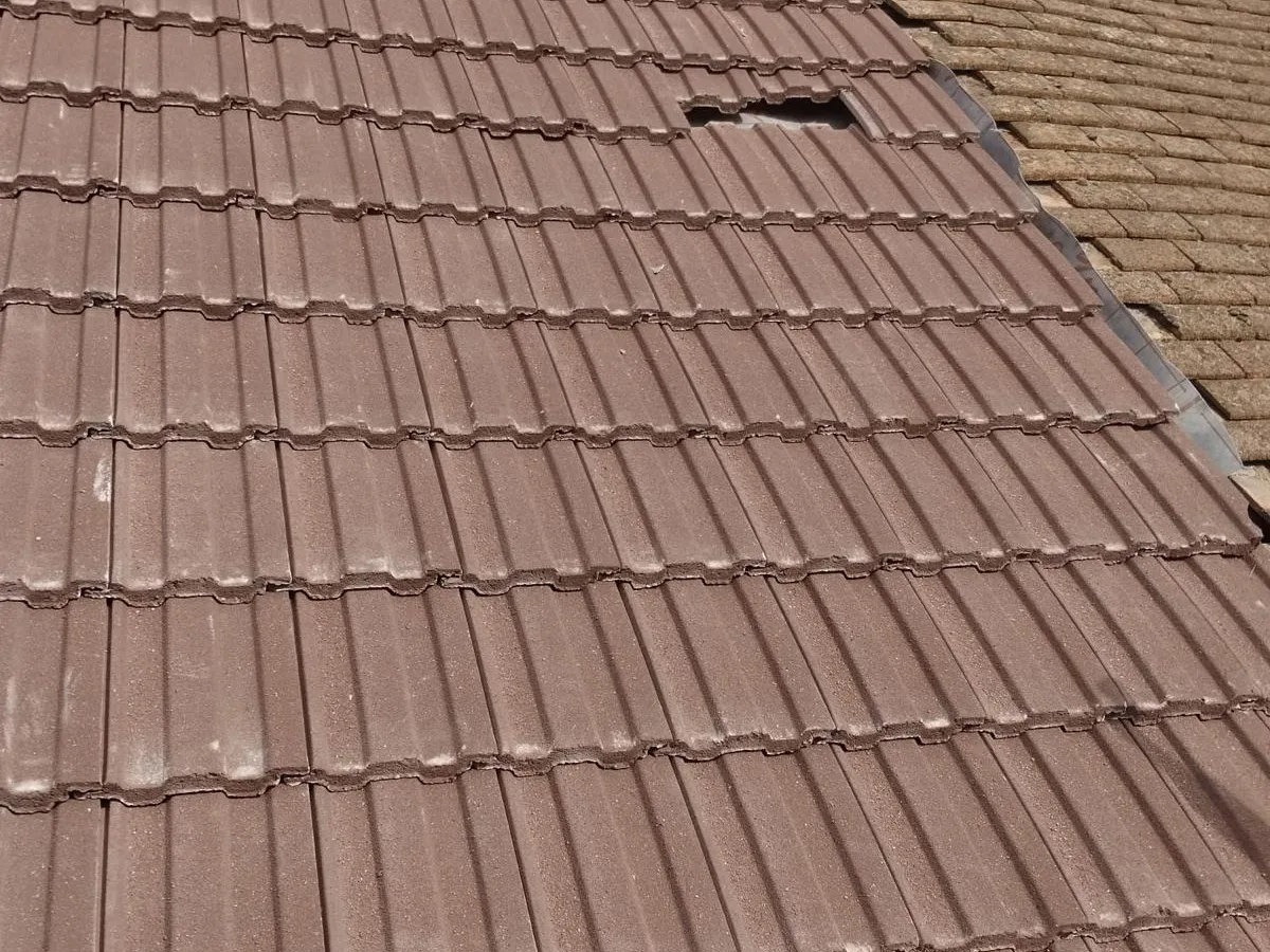 A completed brown tiled roof