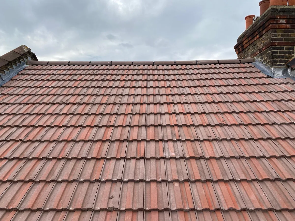 A completed red tiled roof