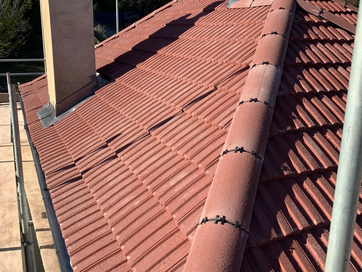 A red tiled roof in the sun