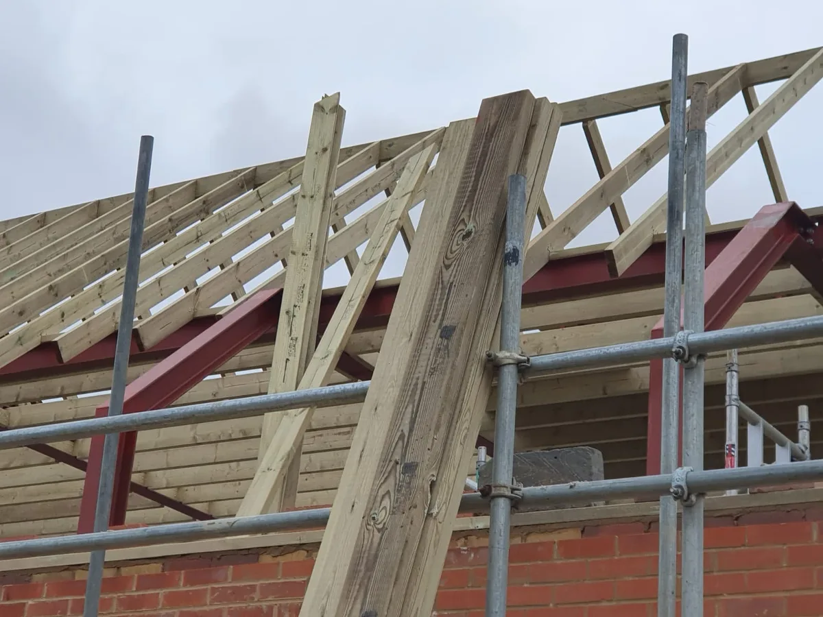 New roof rafters going up