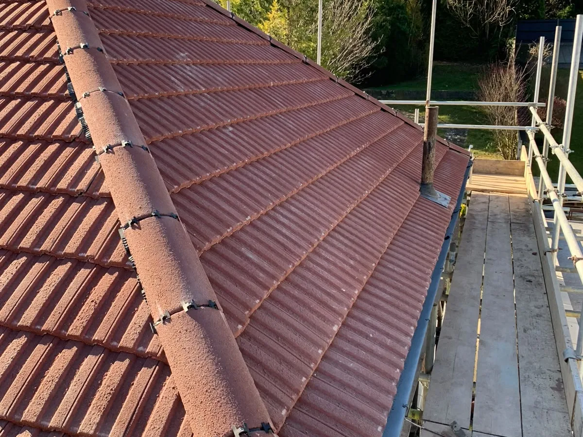 A tiled roof with a swept valley
