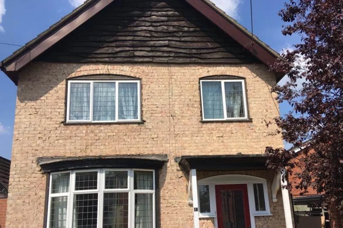A rendered and painted house exterior in Kent