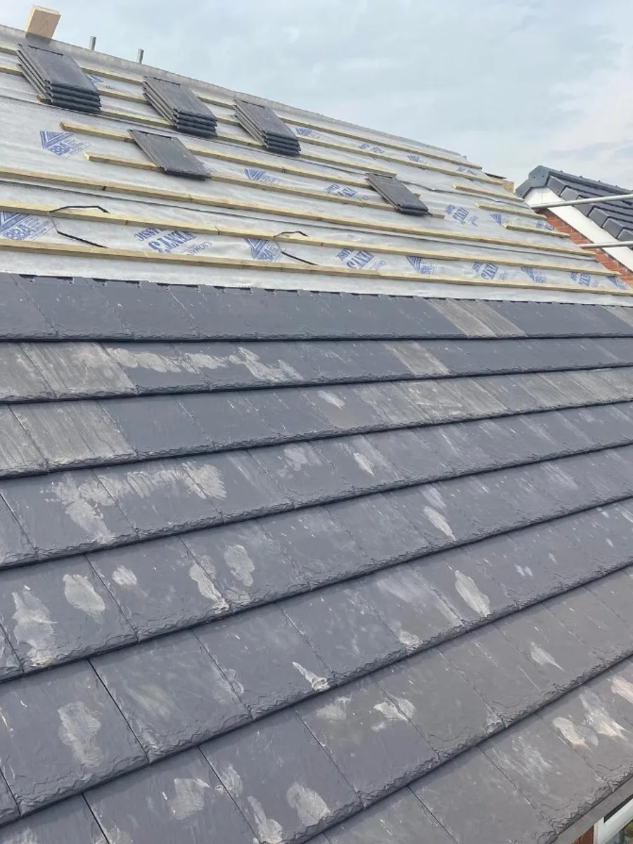 New slate laid over fresh underlay and battens